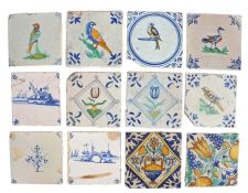 A collection of 18th Century Delft tiles, to include five with polychrome decorated tiles with