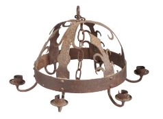 An 18th/19th century wrought-iron 'Dutch Crown' chandelier With three arrowhead finials, six