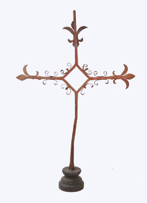 An wrought iron cross, possibly 16th century Mounted on a wooden plinth, centred by an open lozenge, - Image 2 of 2