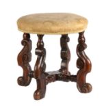 A William & Mary oak and upholstered stool, circa 1690 Having a circular stuff-over seat, and four