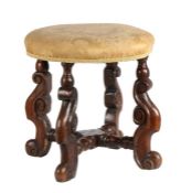 A William & Mary oak and upholstered stool, circa 1690 Having a circular stuff-over seat, and four