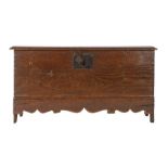 An Elizabeth I oak boarded chest, circa 1600 The moulded edges of the one-piece lid, the edges of