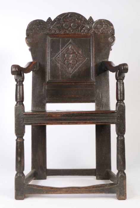 A rare Charles II joined oak 'Durham' panel-back open armchair, circa 1670.  See Lot 81, a court - Image 4 of 5