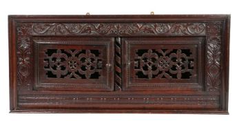 A striking Commonwealth oak mural cupboard, North Country, dated 1651 The top and sides with