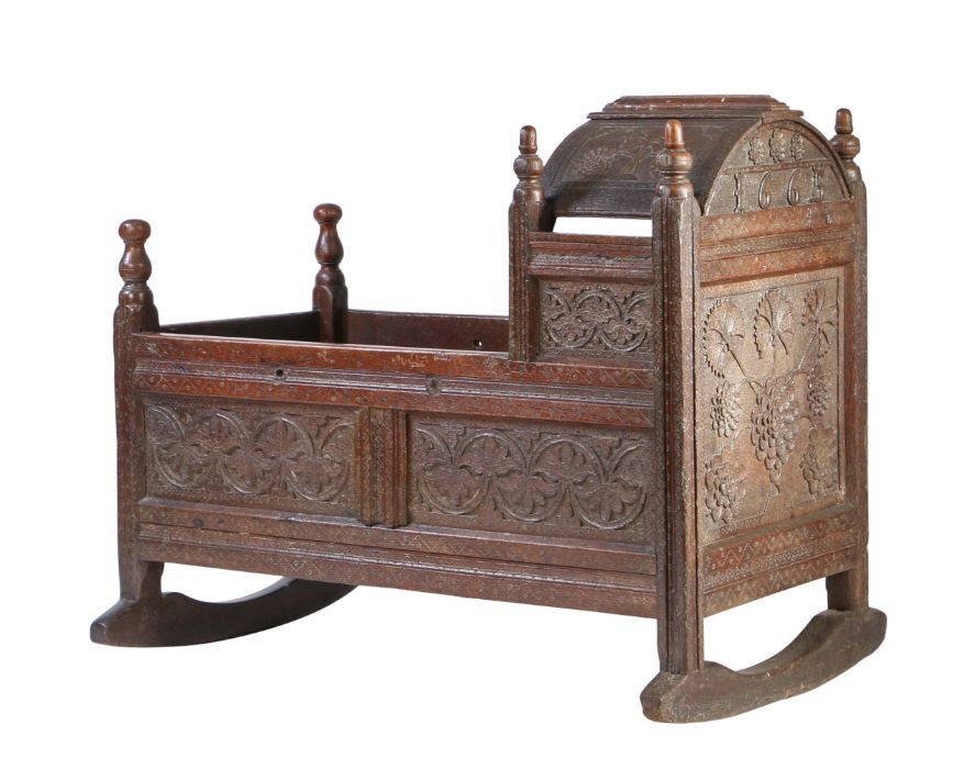 A good Charles II oak cradle, West Country, dated 1665 Having an arched hood, panelled sides, and - Image 2 of 4