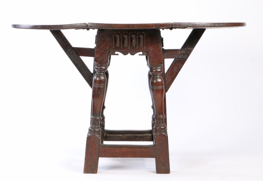 An oak table stool: a rare Elizabeth I oak joint stool, circa 1580, with a 17th century oval drop- - Image 7 of 8