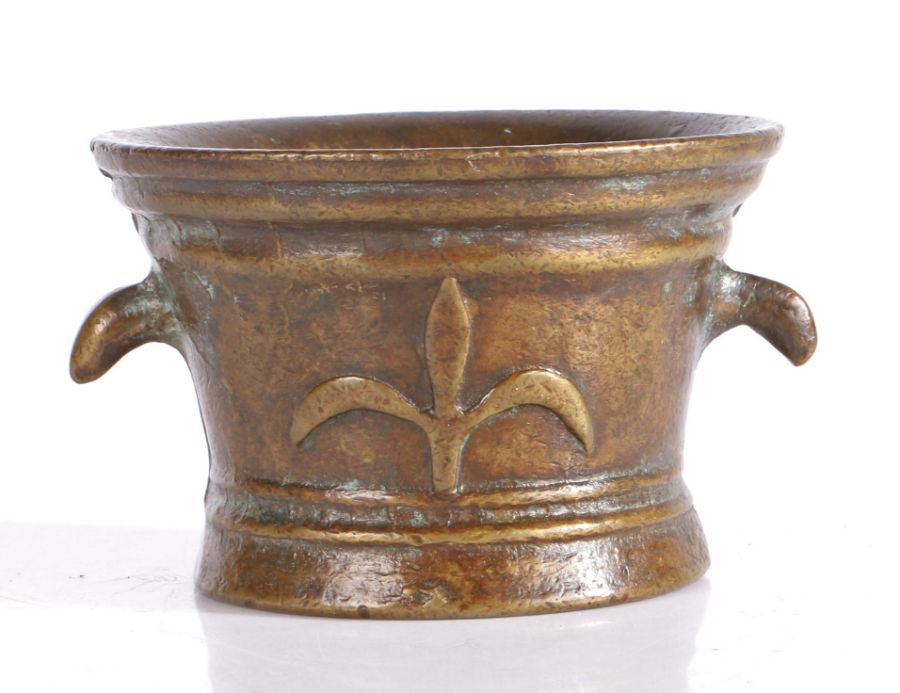 A 17th century style bronze mortar, probably French Cast with a fleur-de-lys, twice, and with two - Image 2 of 2