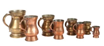 Four late 19th - early 20th century copper measures, Scottish Of baluster form, to include a pint,