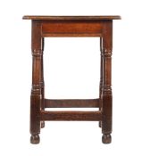 A Charles II oak joint stool, North Country, circa 1660 The top with ovolo-moulded edge, the rails