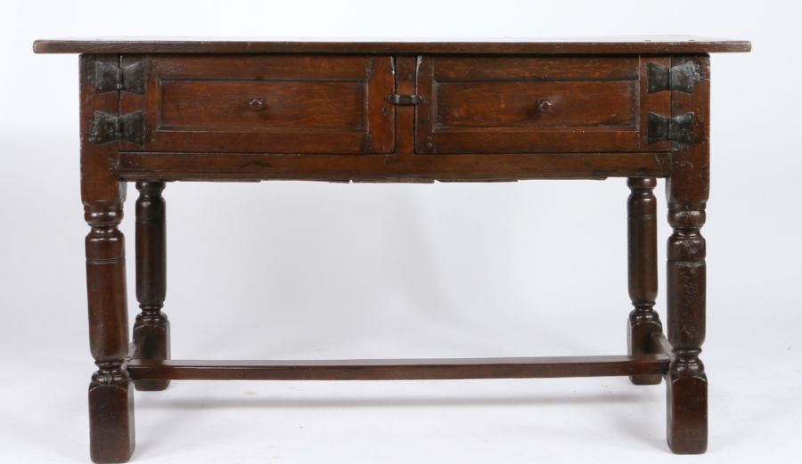 A Charles I oak rent-type table, circa 1630 Having a triple-boarded top, over a pair of panelled - Image 2 of 2
