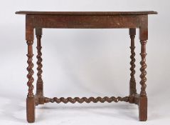 A William & Mary oak centre table, circa 1690 Having a triple-boarded top with ovolo-moulded edge,