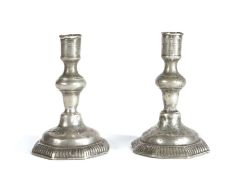 A pair of small pewter candlesticks, probably William & Mary, circa 1690 Each having a cylindrical