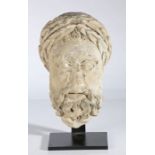 A 'museum quality' 12th/ 13th century limestone head of a male, Italian In the 1st-4th century