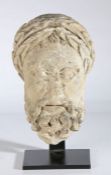 A 'museum quality' 12th/ 13th century limestone head of a male, Italian In the 1st-4th century