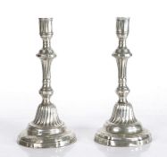A pair of 18th century pewter candlesticks, circa 1760, in the Rococo manner, French The elegant