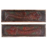 A pair of James I carved oak and rare polychrome-decorated panels, circa 1615 Each carved with an