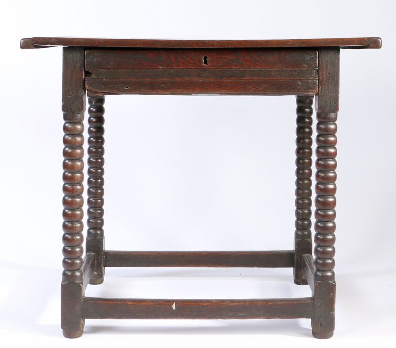 A Charles II oak side table, circa 1680, Having a twin-boarded and end-cleated top, a run-moulded - Image 2 of 3