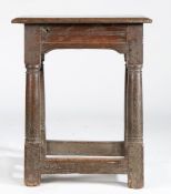 An Elizabeth I/James I oak joint stool, circa 1600-20 Having a double-reeded top, the broad run-