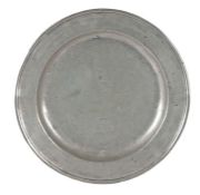 An early 18th century pewter single reeded dish, English, circa 1710 Apparently unmarked, wriggle