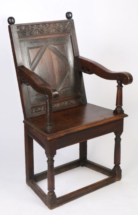 A James I oak panel-back open armchair, West Country, probably Somerset, circa 1620 The back panel - Image 5 of 5
