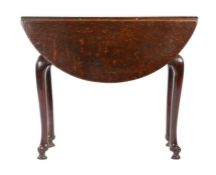 An unusual George I oak gateleg occasional table, circa 1720 Having an oval drop-leaf top, of