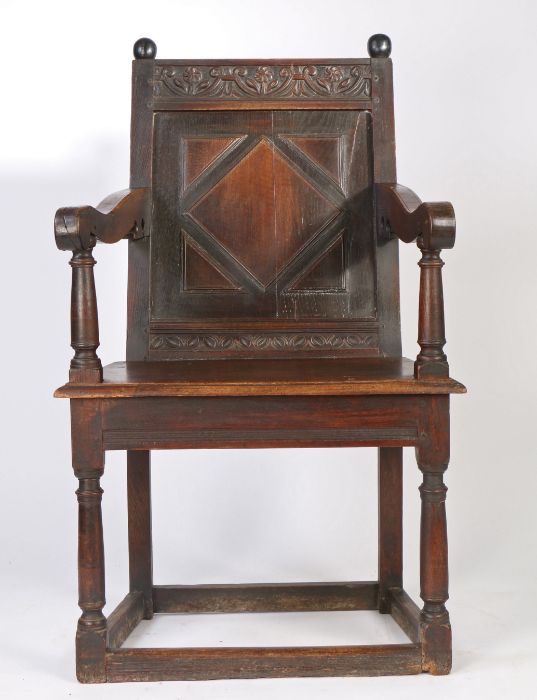 A James I oak panel-back open armchair, West Country, probably Somerset, circa 1620 The back panel - Image 4 of 5