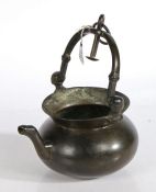 A late 15th century bronze lavabo, Flemish With single spout terminating in a stylised dog's head,