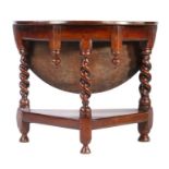 An unusual Charles II oak folding table, of credence -type, Cumbria, circa 1670 Having a circular,