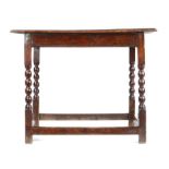 A Charles II elm and oak centre table, circa 1680 The well-figured elm top formed principally from