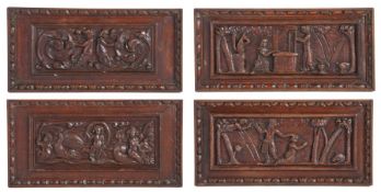 A set of four late 16th century oak carved panels, Flemish, circa 1580 One designed with ‘The
