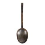 A mid-17th century latten puritan spoon, English, circa 1650 With typical tapering flat stem, rose