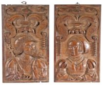 A fine pair of Henry VIII oak figural panels, English, circa 1530 One male, wearing a helmet,