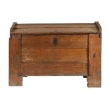 An oak meal chest or ark, circa 1600 Having a typical domed lid of overlapping boards, tenoned