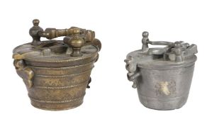 A set of late 17th century bronze alloy cup weights, Nuremberg With dolphin cast swing-handle, and