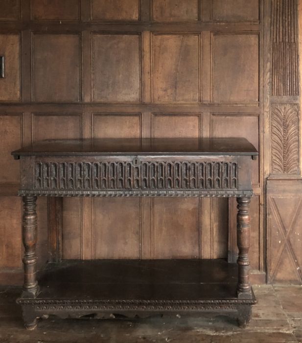 A rare Elizabeth I joined oak box-top side table/court cupboard, circa 1590 The hinged top of two