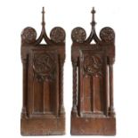 A good pair of 15th/16th century oak bench-ends, with traces of original polychrome-decoration,