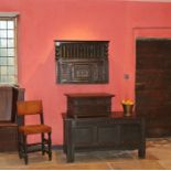 A rare Elizabeth I joined oak and spindle-turned mural livery cupboard, West Country, probably