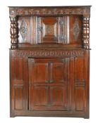 A small Charles I oak court cupboard, West Country, circa 1640 Having a top of two thin boards