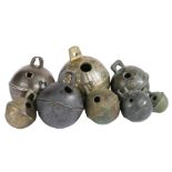 A group of 17th/18th century cast bronze alloy crotal bells, English All spherical with loose