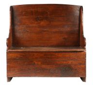 A small George III boarded stained sycamore box-settle, circa 1800 With arched high back, wing-