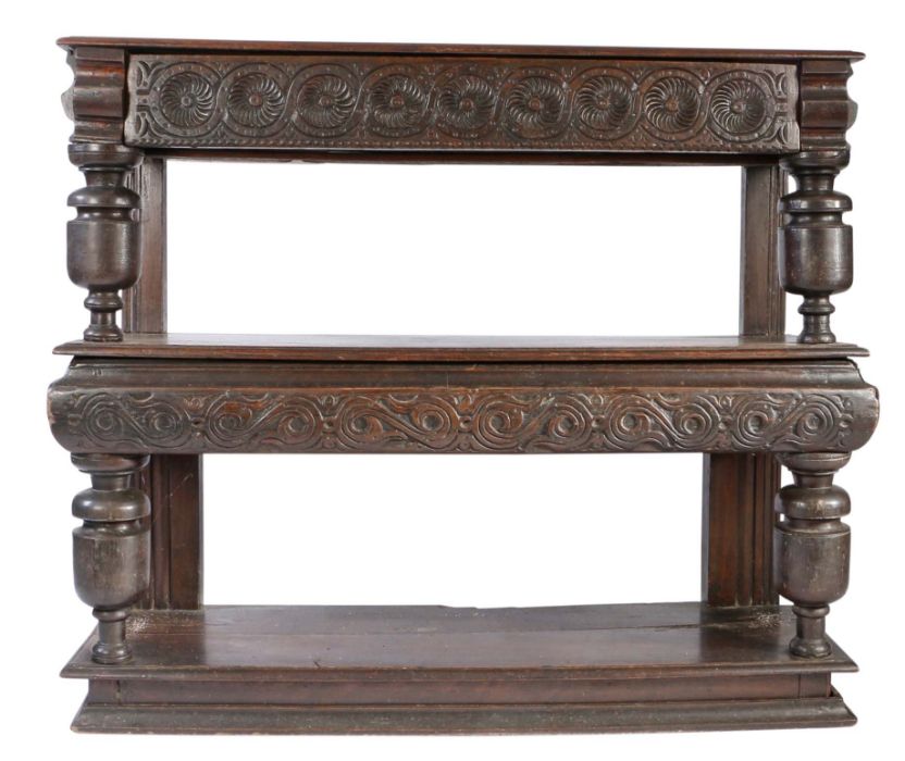 A small Charles I oak three-tier buffet or court cupboard, West Country, circa 1630 The top of two