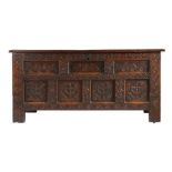 A George I joined oak coffer, Cumbria,  dated 1720 Having a triple-boarded and end-cleated top,