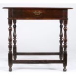 A William & Mary oak side table, circa 1690 Having a twin boarded top with ovolo-moulded edge, plain