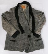 A late 19th century Norwich silk silver & black Paisley pattern jacket, by J.H. & I.C. Steward