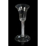 George III wine glass, circa 1750, the trumpet above the multiple spiral air twists on a conical