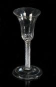 George III wine glass, circa 1750, the trumpet above the multiple spiral air twists on a conical