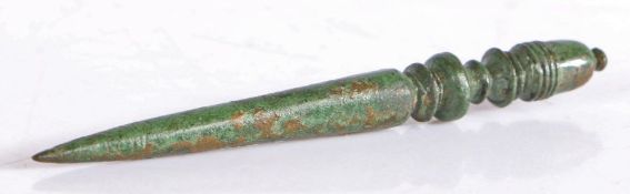 A Roman bronze stylus, 2nd to 3rd Century A.D. With ring and knopped design, 77mm long