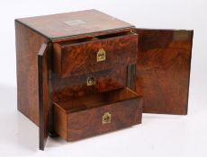 A Good Victorian burr walnut humidor, circa 1860, the rectangular top with a crest inset in white