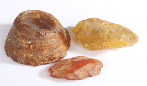Four 19th Century natural resin pieces, one labelled Gum Damar, Singapore worth 65, 24/2/72 (
