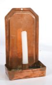 A George III copper wall sconce/candle reflector, the rectangular back with angled top and impressed